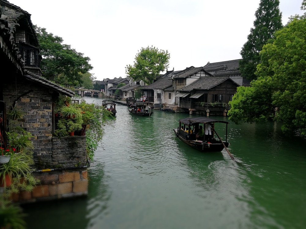 Tour Du Lịch Thượng Hải - Bắc Kinh - Hàng Châu - Ô Trấn | Trung Quốc Địa Danh Du Lịch Ô Trấn | Greenmilestravel.com tour-du-lich-thuong-hai-bac-kinh-hang-chau-o-tran-trung-quoc-dia-danh-du-lich-o-tran