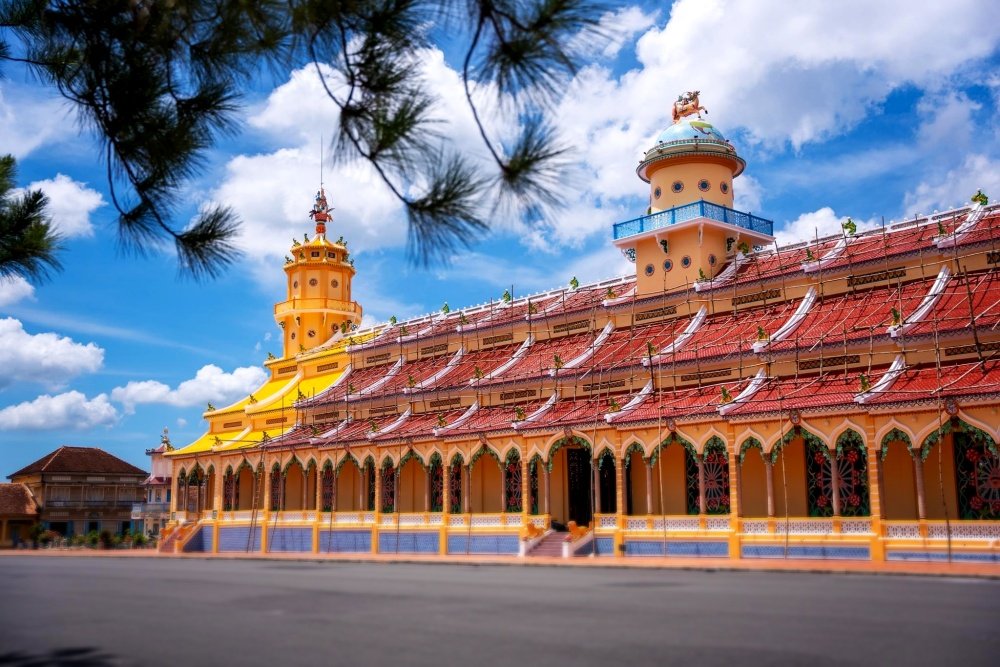Cao Dai Temple & Cu Chi Tunnel Tour | Ho Chi Minh City 700000 | Vietnam Facade | Greenmilestravel.com cao-dai-temple-cu-chi-tunnel-tour-ho-chi-minh-city-700000-vietnam-facade