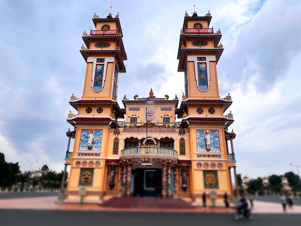 Cao Dai Temple & Cu Chi Tunnel Tour | Ho Chi Minh City 700000 | Vietnam Facade | Greenmilestravel.com cao-dai-temple-cu-chi-tunnel-tour-ho-chi-minh-city-700000-vietnam-facade